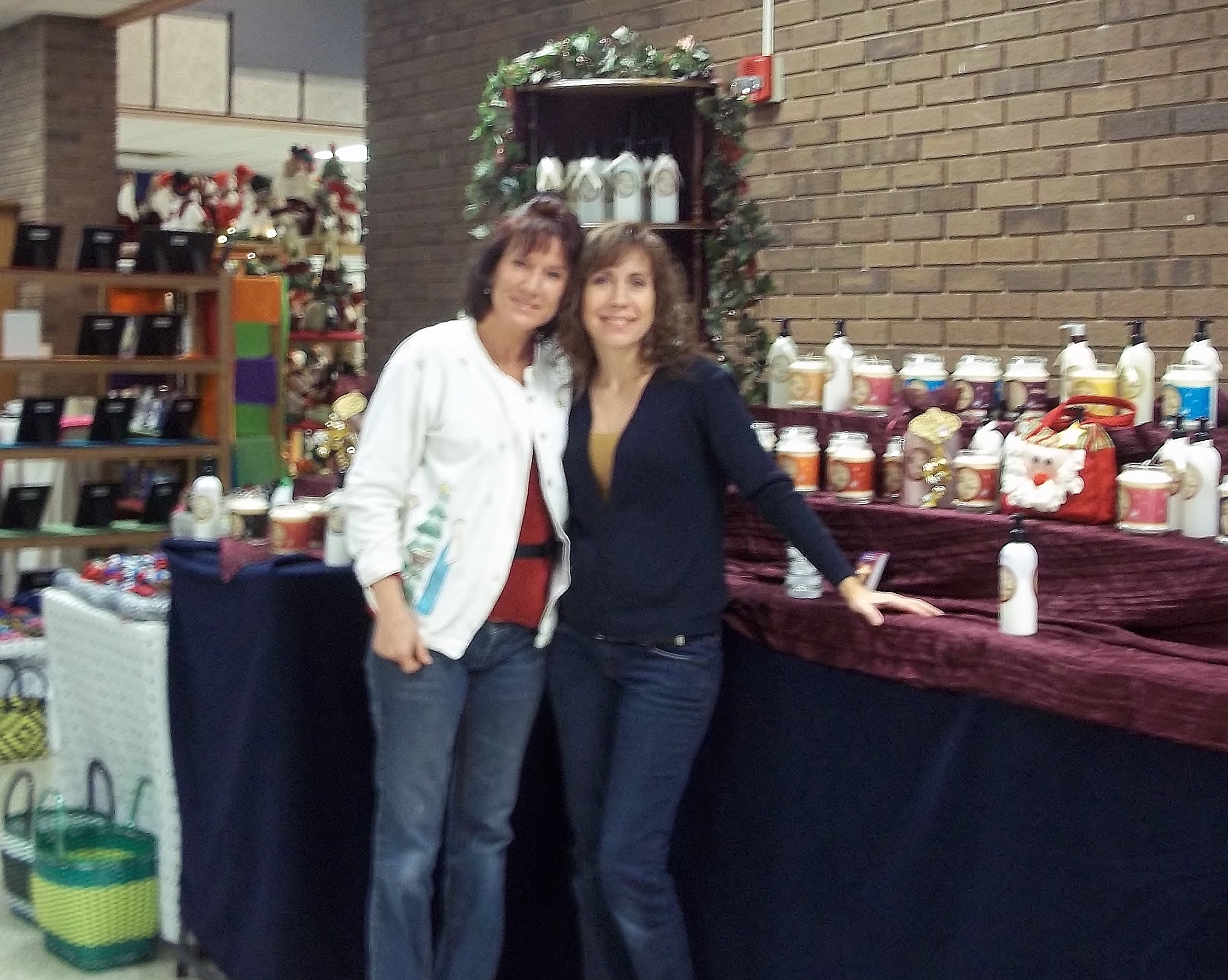Lisa and Brenda with scented soy Christian candles